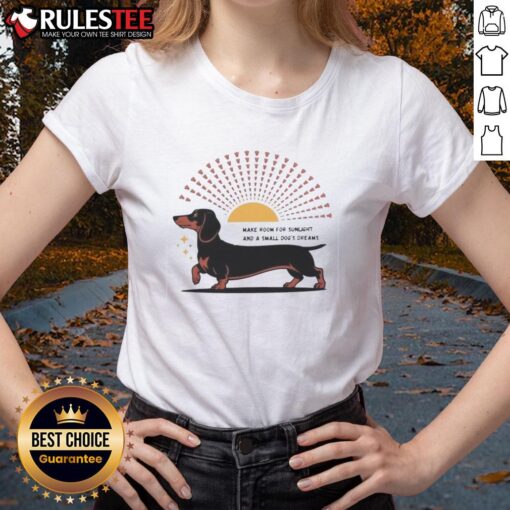 Awesome Dachshund dog enjoying sunlight, perfect for small dog lovers; stylish ladies tee featuring a playful design.