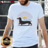 Awesome Dachshund dog graphic on a t-shirt, capturing sunlight and dreams, perfect for dog lovers and pet enthusiasts.