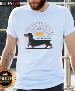 Awesome Dachshund dog graphic on a t-shirt, capturing sunlight and dreams, perfect for dog lovers and pet enthusiasts.