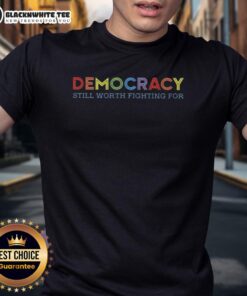 Awesome Democracy Still Worth Fighting For T-Shirt featuring bold text on a stylish black background, perfect for activists.