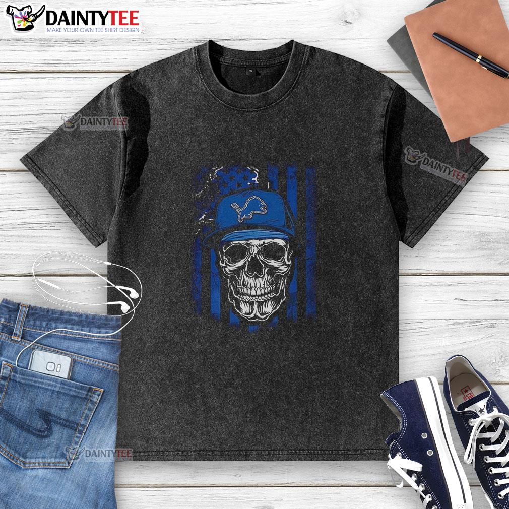 awesome-detroit-lions-nfl-skull-american-flag-football-lover-washed-t-shirt Alt Text: Awesome Detroit Lions NFL skull graphic on American flag washed t-shirt for football lovers.