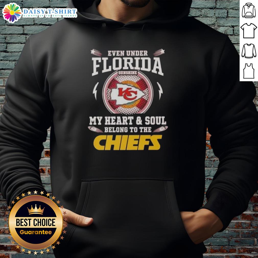 Awesome Even Under Florida Sunshine My Heart And Soul Belong To The Kansas City Chiefs Hoodie Person wearing a Kansas City Chiefs hoodie enjoying the Florida sunshine, showcasing team pride and style.