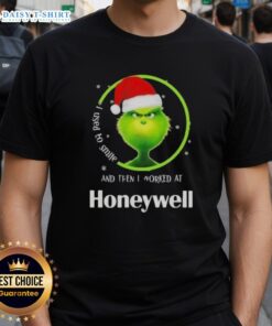 Funny Grinch Christmas t-shirt featuring 'I Used To Smile And Then I Worked At Honeywell' design for holiday humor.
