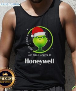 Funny Grinch Christmas tank top with text 'I Used To Smile And Then I Worked At Honeywell' for holiday humor.