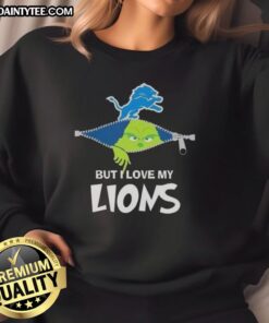 Alt Text: Awesome Grinch sweatshirt featuring Detroit Lions logo, perfect for football fans and holiday cheer.