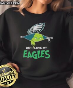 Awesome Grinch sweatshirt showcasing love for Philadelphia Eagles football, perfect for fans during the holiday season.