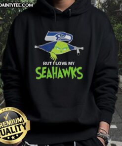 Awesome Grinch in a Seattle Seahawks football hoodie, showcasing team spirit and holiday cheer.