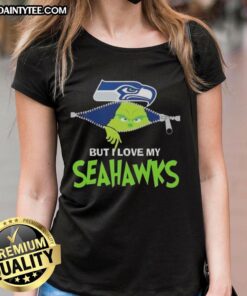 Awesome Grinch graphic on a Seattle Seahawks football ladies tee, perfect for fans celebrating the holiday season.