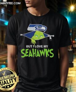 Awesome Grinch T-shirt featuring a Seattle Seahawks design, perfect for holiday cheer and football fans alike.