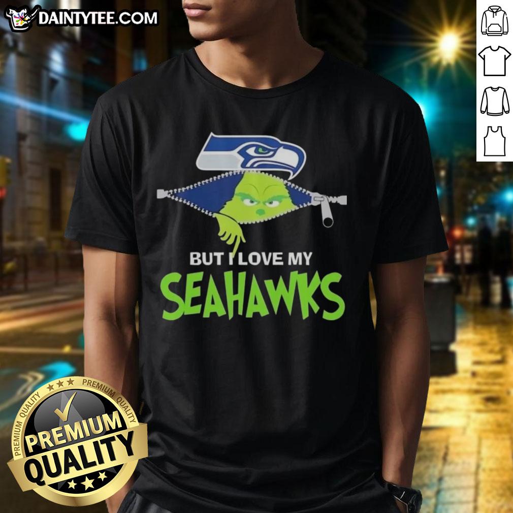 awesome-grinch-but-i-love-my-seattle-seahawks-football-t-shirt-1 Awesome Grinch T-shirt featuring a Seattle Seahawks design, perfect for holiday cheer and football fans alike.