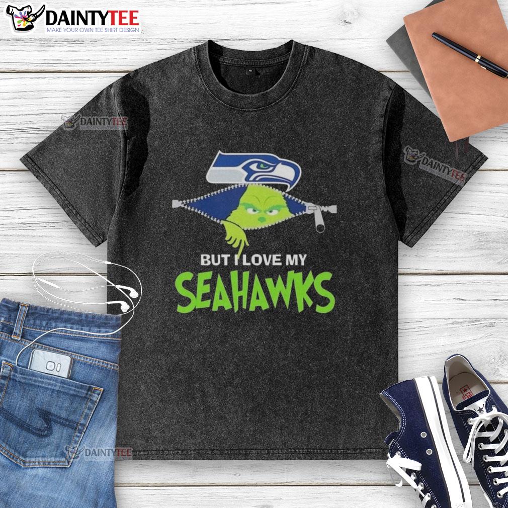 awesome-grinch-but-i-love-my-seattle-seahawks-football-washed-t-shirt Awesome Grinch graphic on a washed Seattle Seahawks football t-shirt, perfect for fans showing team spirit.