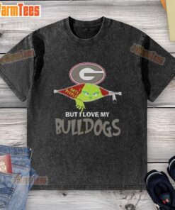 Awesome Grinch Christmas design on a washed t-shirt featuring love for Georgia Bulldogs, perfect for festive fans.