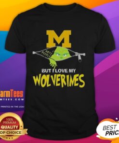 Alt Text: Awesome Grinch Christmas T-Shirt featuring Michigan Wolverines logo, perfect for festive fans celebrating the holidays.