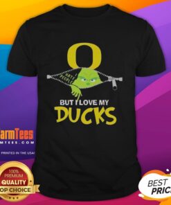 Awesome Grinch Christmas shirt featuring Oregon Ducks logo, perfect for festive fans celebrating the holidays.