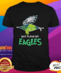 Alt Text: Awesome Grinch Christmas t-shirt featuring Philadelphia Eagles logo, perfect for holiday fans and sports enthusiasts.