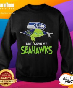 Awesome Grinch Christmas sweatshirt featuring Seattle Seahawks design, perfect for festive football fans.