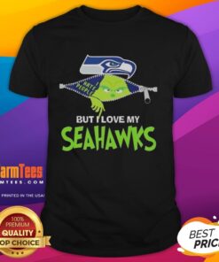 Awesome Grinch Christmas T-Shirt featuring Seattle Seahawks logo, perfect for festive fans celebrating the holidays.