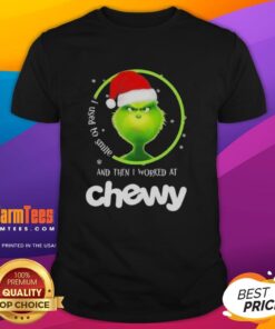 Awesome Grinch Christmas t-shirt featuring 'I Used To Smile And Then I Worked At Chewy' slogan in festive design.