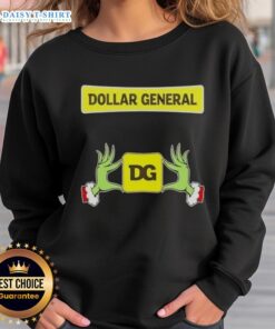 Alt Text: Awesome Grinch hands on a festive sweatshirt from Dollar General, perfect for Christmas celebrations and holiday cheer.
