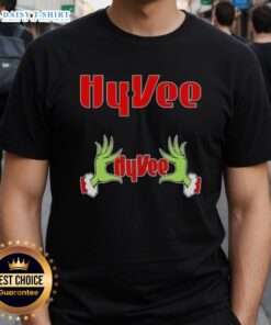 Alt Text: Awesome Grinch hands holding a heart on a Hyvee Christmas T-Shirt, perfect for festive holiday celebrations.