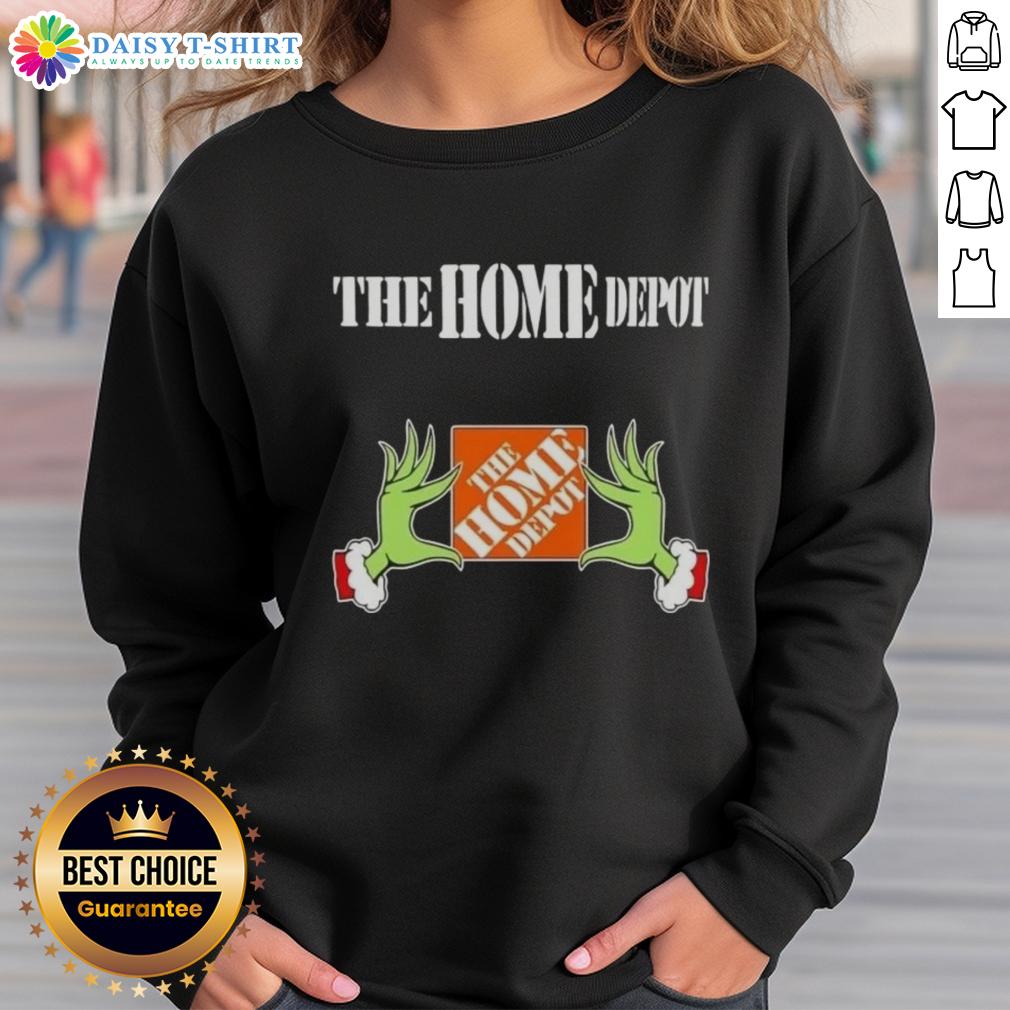 Awesome Grinch Hands Love The Home Depot Christmas Sweatshirt Alt Text: Awesome Grinch hands holding a mug, featuring The Home Depot Christmas sweatshirt design in festive colors.