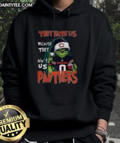 Awesome Grinch hoodie featuring Carolina Panthers and Chicago Bears designs, perfect for football fans.