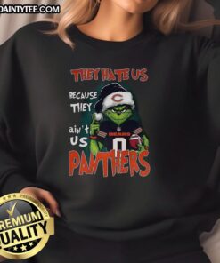Awesome Grinch sweatshirt featuring Carolina Panthers and Chicago Bears designs - perfect for football fans.