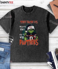 Alt Text: Awesome Grinch 'They Hate Us Because They Ain't Us' Carolina Panthers and Chicago Bears football washed t-shirt.