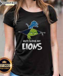 Awesome Grinch tee featuring 'I Hate People But I Love My Detroit Lions' design for Christmas football fans.