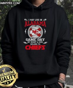 Man wearing a Kansas City Chiefs hoodie, showcasing team spirit in Arkansas on game day, heart and soul devoted to Chiefs.