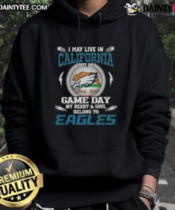 Alt Text: Fan wearing Philadelphia Eagles hoodie, showcasing team spirit on game day in California.