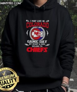 Alt Text: Kansas City Chiefs hoodie worn proudly by a fan in Colorado on game day, showcasing team spirit and loyalty.