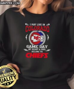Alt Text: Kansas City Chiefs sweatshirt showing pride for the team, perfect for game day in Colorado.