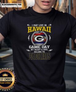 Alt Text: Green Bay Packers T-shirt with 'I May Live In Hawaii But On Game Day My Heart Belongs To Packers' design.