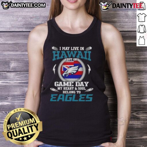 Alt Text: Woman wearing 'I May Live In Hawaii But My Heart Belongs To Philadelphia Eagles' tank top, showcasing team pride.