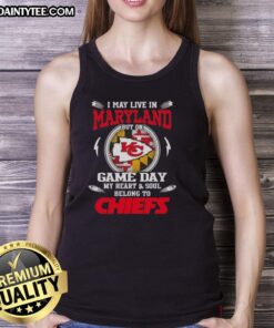 Maryland fan wearing Kansas City Chiefs tank top, showcasing team spirit on game day with vibrant colors.