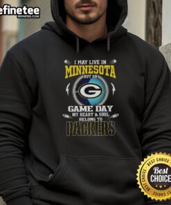 Person wearing a Green Bay Packers hoodie, showing team spirit on game day in Minnesota.