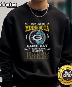 Green Bay Packers sweatshirt worn proudly by a fan in Minnesota on game day, showcasing team spirit and loyalty.
