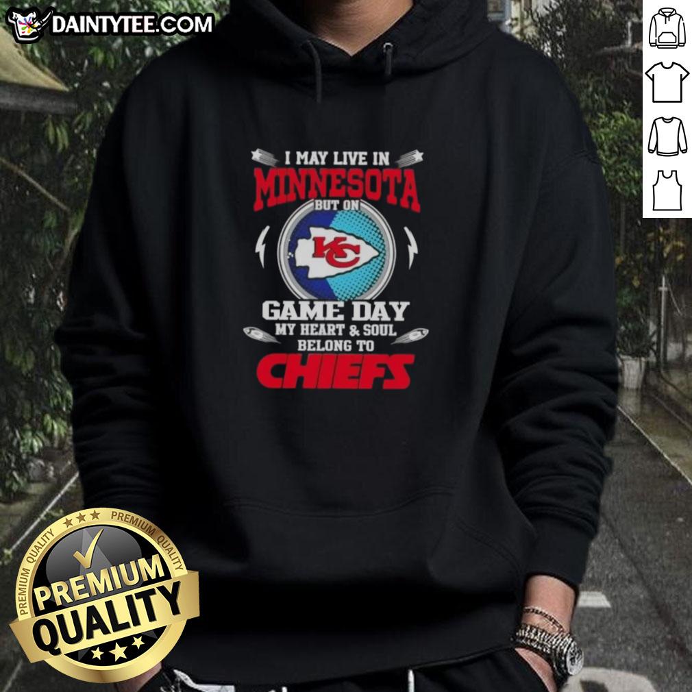 awesome-i-may-live-in-minnesota-but-on-game-day-my-heart-and-soul-belongs-to-kansas-city-chiefs-football-hoodie Kansas City Chiefs football hoodie worn by a fan in Minnesota, showcasing team spirit on game day.