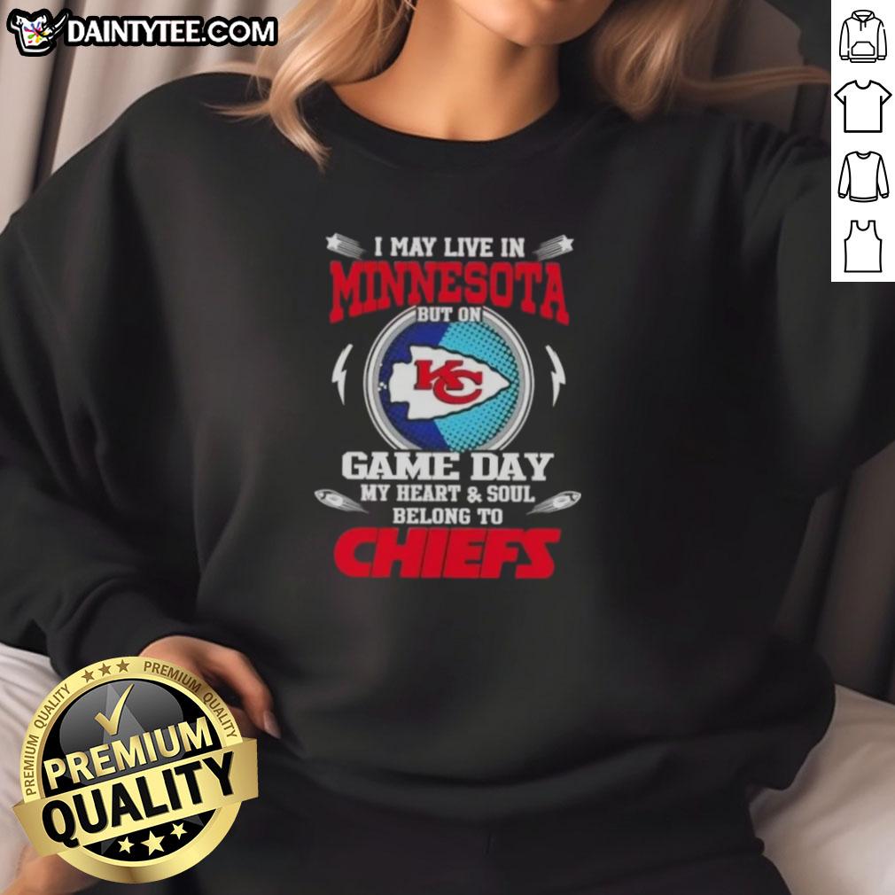 awesome-i-may-live-in-minnesota-but-on-game-day-my-heart-and-soul-belongs-to-kansas-city-chiefs-football-sweatshirt Cozy Kansas City Chiefs sweatshirt, perfect for game day, showcasing team spirit and pride while living in Minnesota.