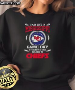 Kansas City Chiefs sweatshirt, showcasing pride for the team while living in Mississippi on game day.