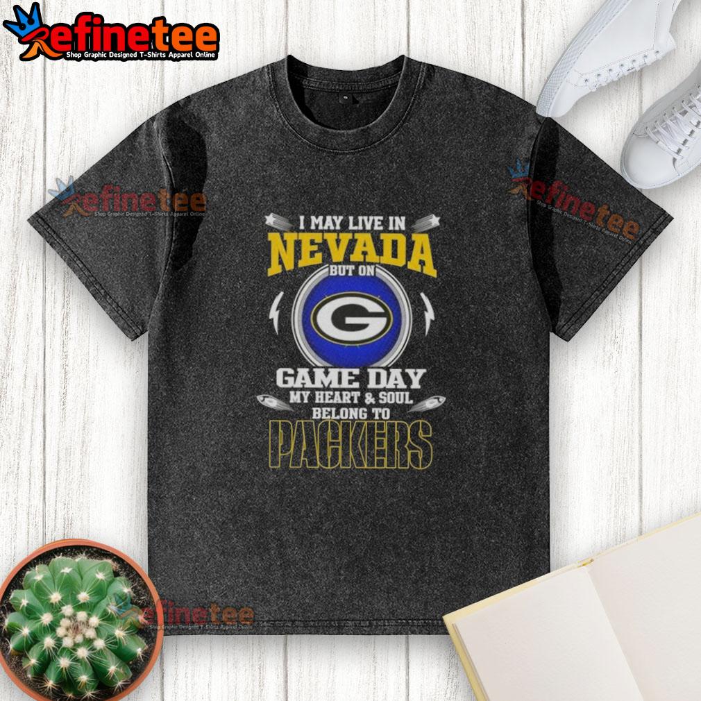 awesome-i-may-live-in-nevada-but-on-game-day-my-heart-and-soul-belongs-to-green-bay-packers-washed-t-shirt Green Bay Packers washed t-shirt for fans in Nevada, showcasing team spirit on game day with vibrant colors.