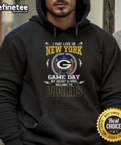 Alt Text: Person wearing a Green Bay Packers hoodie, showcasing team pride on game day in New York.