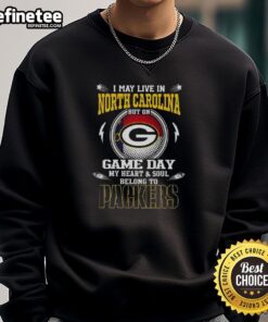Green Bay Packers sweatshirt with 'I may live in North Carolina but my heart belongs to the Packers' printed design.