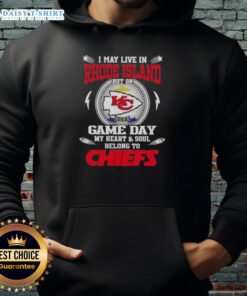 Person wearing a Kansas City Chiefs hoodie, showcasing team pride while living in Rhode Island on game day.