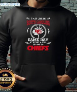 Person wearing a Kansas City Chiefs hoodie, showcasing team spirit on game day in South Carolina.