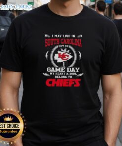 Alt Text: Kansas City Chiefs T-shirt with 'Awesome I May Live In South Carolina But On Game Day My Heart Belongs To KC' design.