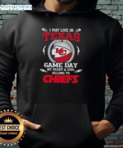 Person wearing a Kansas City Chiefs hoodie, showcasing team pride on game day, despite living in Texas.