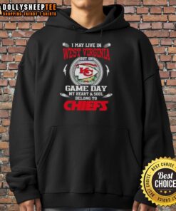 Person wearing a Kansas City Chiefs hoodie, showing team spirit on game day in West Virginia.
