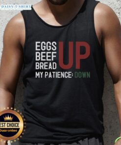 Trendy tank top featuring 'Inflation Frustration' graphic with eggs, beef, and bread, expressing economic struggles creatively.